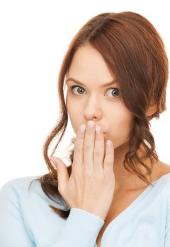 picture of amazed woman with hand over mouth