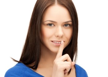 picture of mysterious woman with finger on her lips