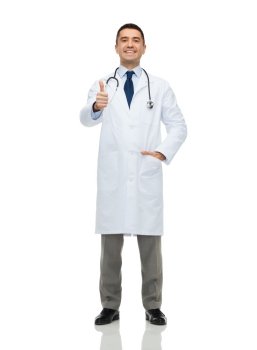healthcare, profession, people and medicine concept - smiling male doctor in white coat showing thumbs up