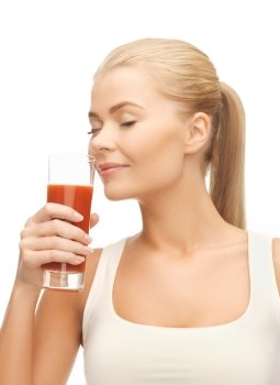 close up of young woman drinking tomato juice