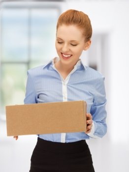 picture of businesswoman with parcel in office