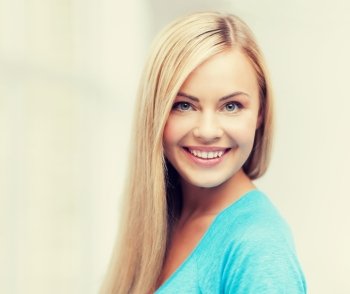 bright close up of smiling woman indoors. close up of woman