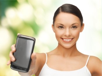 beautiful sporty woman showing smartphone with app