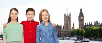 childhood, travel, tourism, friendship and people concept - happy smiling boy and girls hugging over london city background