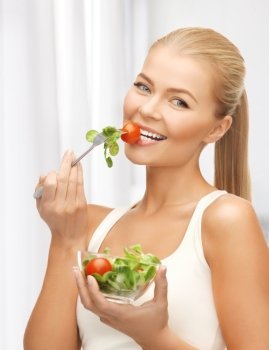 picture of healthy woman holding bowl with salad