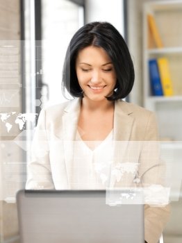 picture of friendly businesswoman with laptop computer and virtual screen