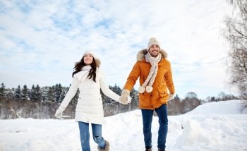 people, season, love and leisure concept - happy couple running in winter snow