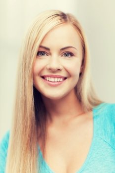 bright close up of smiling woman indoors. close up of woman