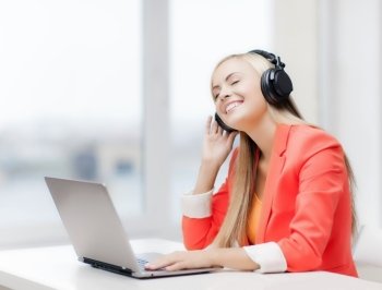 happy woman with headphones listening to music