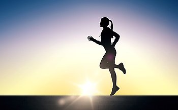 fitness, sport, people and healthy lifestyle concept - happy young sports woman running outdoors