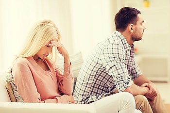 people, relationship difficulties, conflict and family concept - unhappy couple having argument at home
