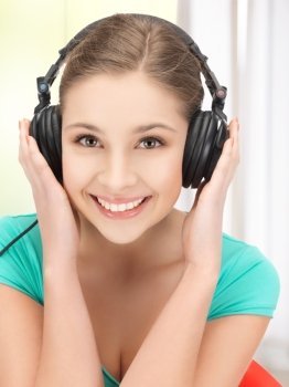 picture of happy and smiling girl with headphones