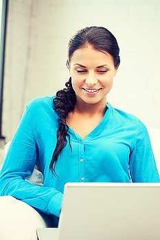 picture of happy woman with laptop computer.. happy woman with laptop computer