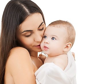 family, parenting and child care concept - happy mother kissing adorable baby