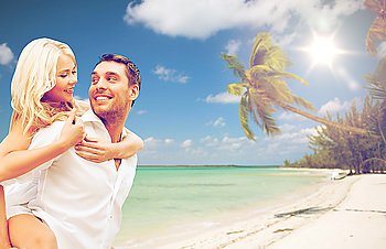 travel, tourism, summer holidays, vacation and love concept - happy couple having fun over exotic tropical beach with palm trees background