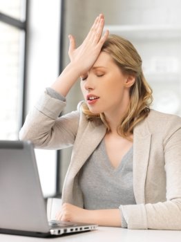 picture of stressed woman with laptop computer