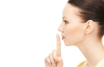 bright picture of young woman with finger on lips