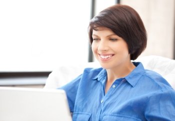 picture of happy woman with laptop computer