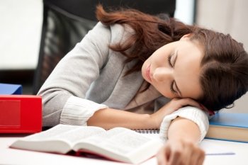 bright picture of sleeping woman with book