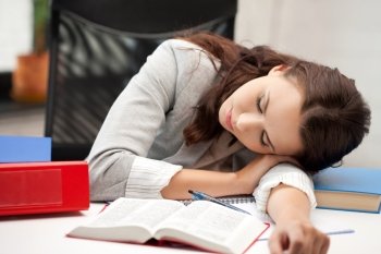 bright picture of sleeping woman with book