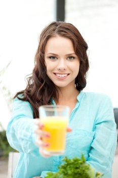 .picture of beautiful woman with glass of juice. .