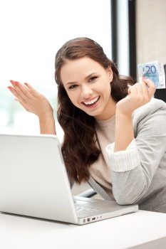 picture of happy woman with laptop computer and euro cash money