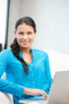 picture of happy woman with laptop computer.