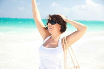 picture of happy woman at the beach