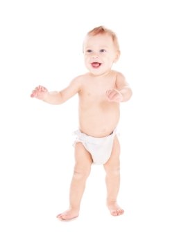 picture of standing baby boy in diaper over white