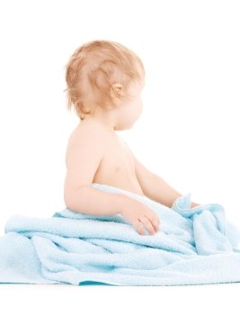 picture of baby boy with blue towel over white