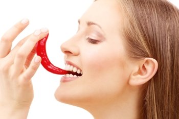 picture of lovely woman with hot chili pepper