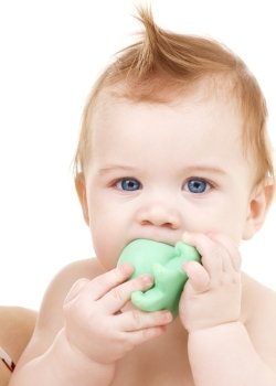 picture of baby boy with green plastic toy
