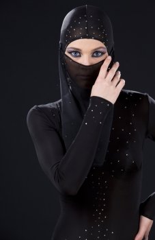 picture of ninja woman in the dark