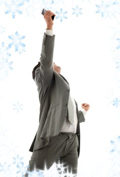 happy businessman with cellular phone and snowflakes