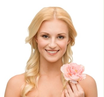 beauty and floral concept - bright picture of smiling woman with peony flower
