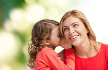 family, child, relationships and happiness concept - smiling mother and daughter whispering gossip