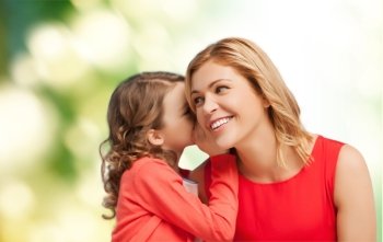 family, child, relationships and happiness concept - smiling mother and daughter whispering gossip