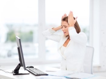 business, office, school and education concept - stressed businesswoman with computer at work