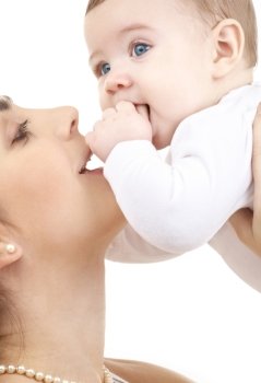 picture of happy mother with baby over white (focus on mother)
