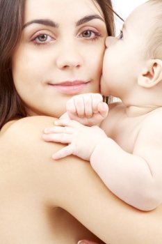 closeup portrait of happy mother with baby 