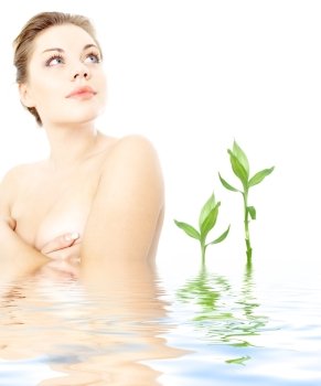 portrait of pretty topless girl relaxing in spa