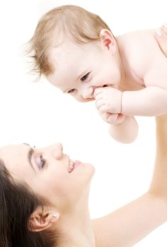 picture of happy mother with baby over white (focus on baby)