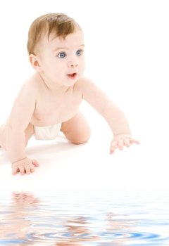 bright picture of crawling baby boy in diaper