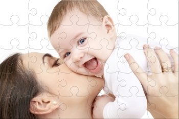 puzzle picture of happy mother with baby over white
