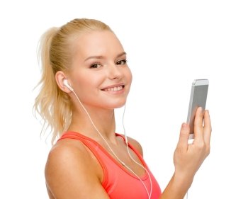 sport, fitness, technology, internet and healthcare - smiling sporty woman with smartphone and earphones