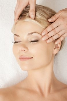 picture of happy beautiful woman in massage salon