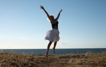 picture of pretty blonde jumping