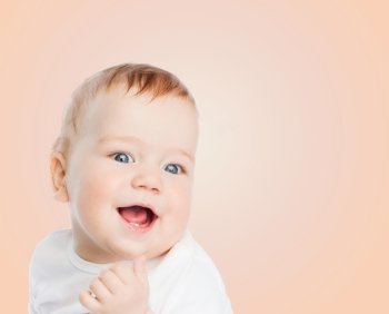 child and happiness concept - smiling baby