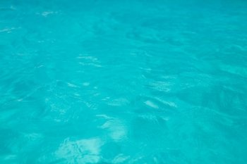 ocean, sea, travel, vacation and background concept - water in pool, sea or ocean