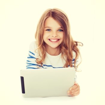 education, technology and internet concept - smiling little student girl with tablet pc computer